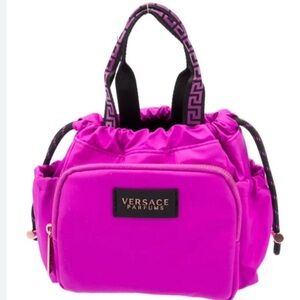 Versace Make up/perfume bag in excellent like new condition.Beautiful color.